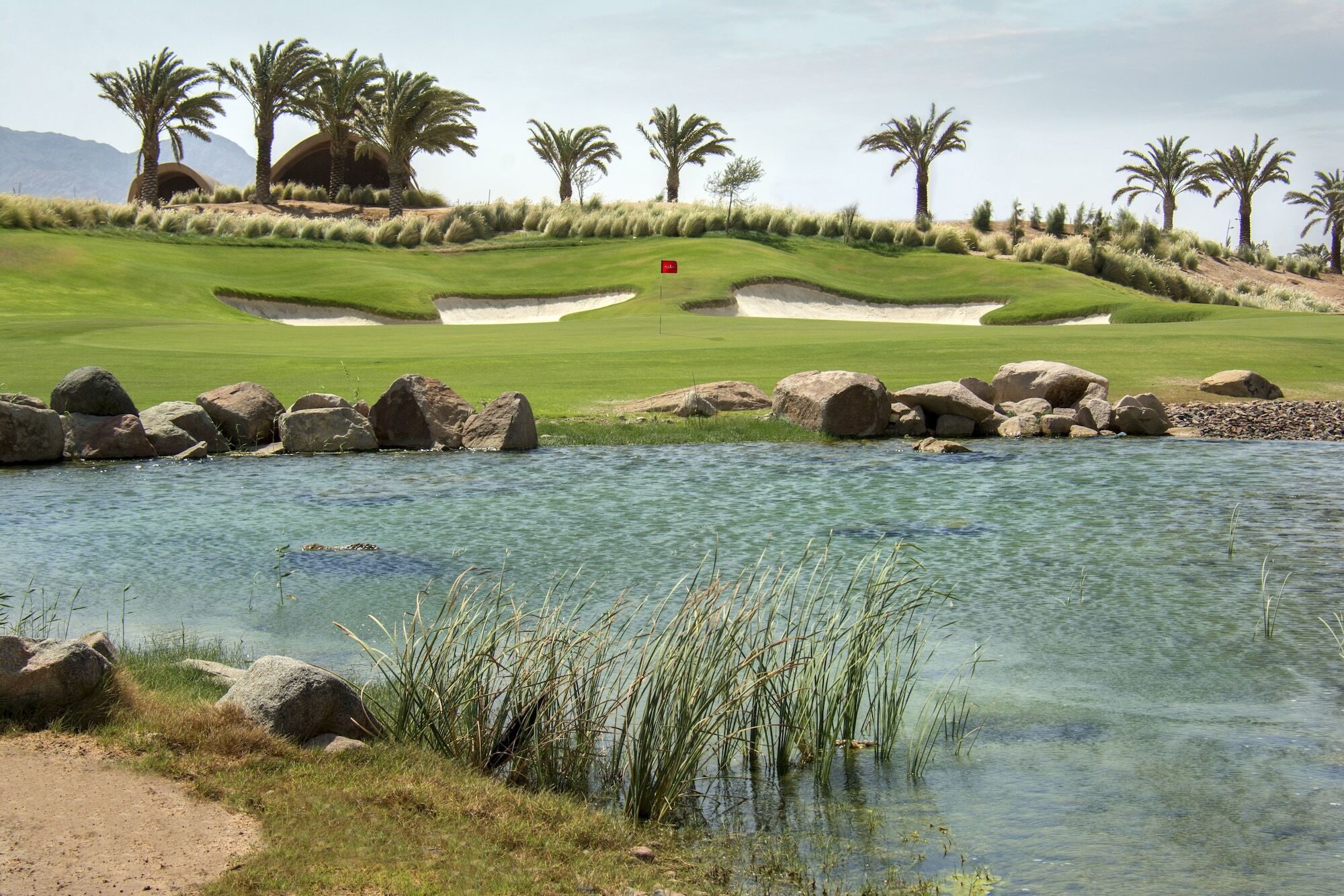 Hyatt Regency Aqaba Ayla Resort Exterior photo Golf course at the resort